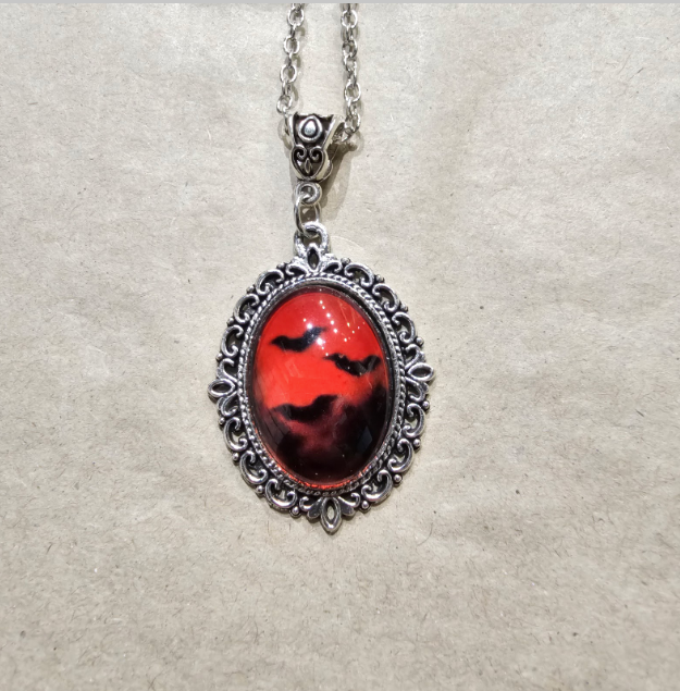 LNK7 3 Bats In A Red Frame Necklace